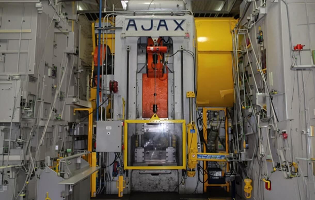 Ajax MN Series mechanical forging press installed in a production facility showing ram, die seat, and guide system