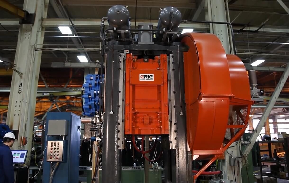 Erie Press mechanical forging press showing eight-point ram guide system and flywheel drive assembly